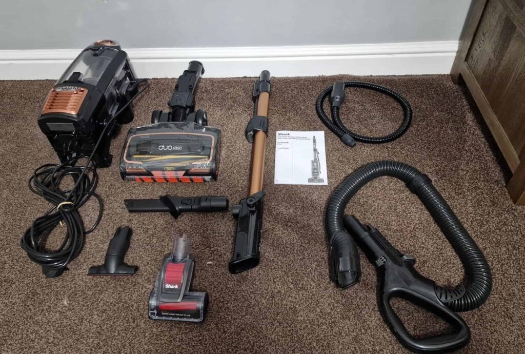view of our own purchase testing shark upright vacuum cleaner with anti hair wrap technology our unboxing package arrival several weeks to month 